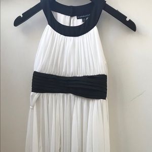 White halter neck dress with black accents